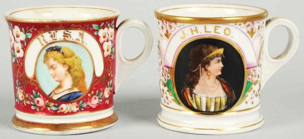 Lot of 2: Portrait Shaving Mugs.: Includes one with gilt name "J.H. Leo" and one with gilt name "R.L.S.A.". Both with images of pretty women. Condition (Excellent). Size Each: 3 - 1/2" T.
