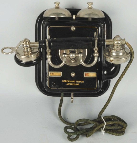 Danish Black Wall Telephone.: Circa 1930, black steel with nickeled brass cradle, receiver and gongs, Kjobenhavns Telefon Aktieselskab on front and transmitter. Condition (Excellent). Size 9 - 1/2" T.