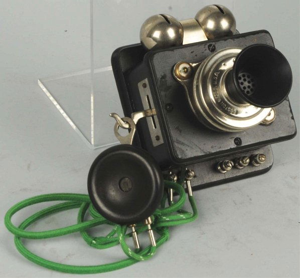 Couch and Seeley Compact Telephone.: Circa 1910, black painted wood, sleigh bells, marked transmitter, cast iron watch case receiver. Condition (Excellent). Size 5 - 1/2" L.