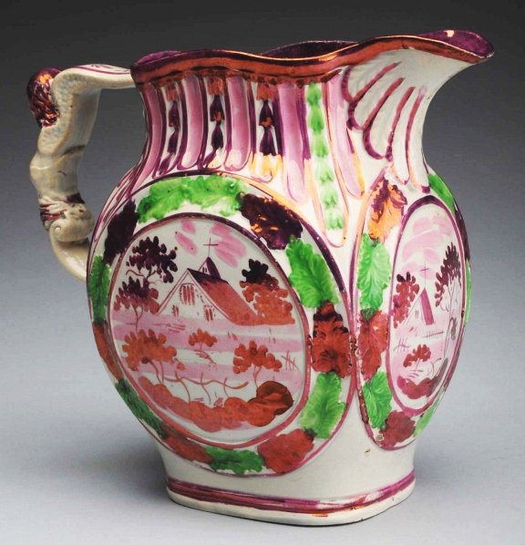 Early 19th Century Pearlware Water Pitcher.: With pink lustre decoration of a house and unusual mermaid handle. Condition (Excellent). Size 6 - 1/2" T.