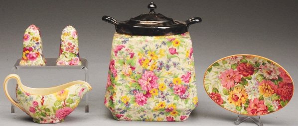 Lot of 5: Floral Chintz Pottery Pieces.: Includes salt and pepper shakers and one cookie jar. Most are signed "Royal Winton". Condition (Excellent). Size Largest: 7 - 1/2" T.