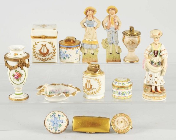 Lot of 11: Porcelain & China Pieces.: Includes one Limoge lighter and box, one vase with brass overlay, one lighter with loose hinge, one Tiffany porcelain lidded box, one pair of bisque figures, and other items. Condition (Excellent). Si