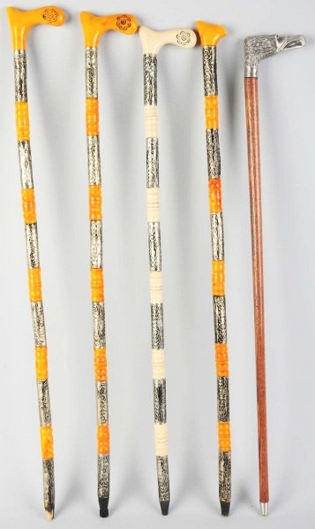 Lot of 5: Contemporary Walking Stick Canes.: One out of the five cane handles is missing. Condition (Very Good - Excellent). Size Largest: 38" L.