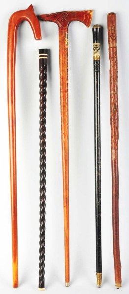 Lot of 5: Walking Stick Canes.: Includes one made of twisted wood, one with horse's head, two Folk Art cane, and one with lion's head top. Condition (Very Good - Excellent). Size Largest: 38" L.