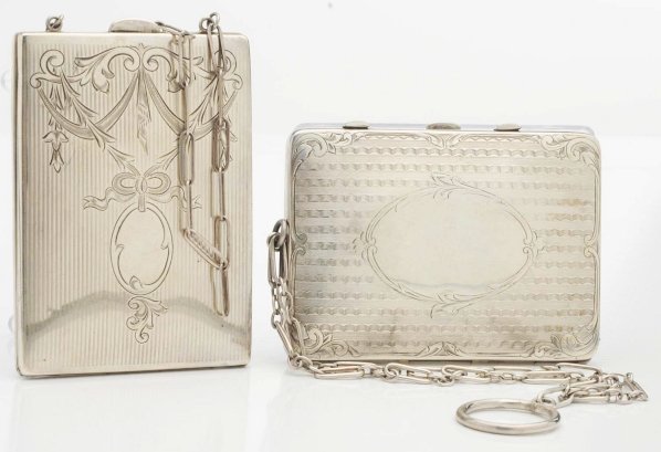 Lot of 2: Sterling Silver Compacts.: Includes one with mirror and change purse and one with mirror, pencil, and four compartments. Weight: 7.25 troy ounces. Condition (Excellent). Size Largest: 3 - 1/2" x 2 - 1/2".