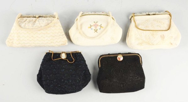 Lot of 5: Beaded Purses.: Circa 1910. A few with minor missing beadwork. Condition (Excellent). Size Largest: 6 - 1/2" x 8 - 1/2".