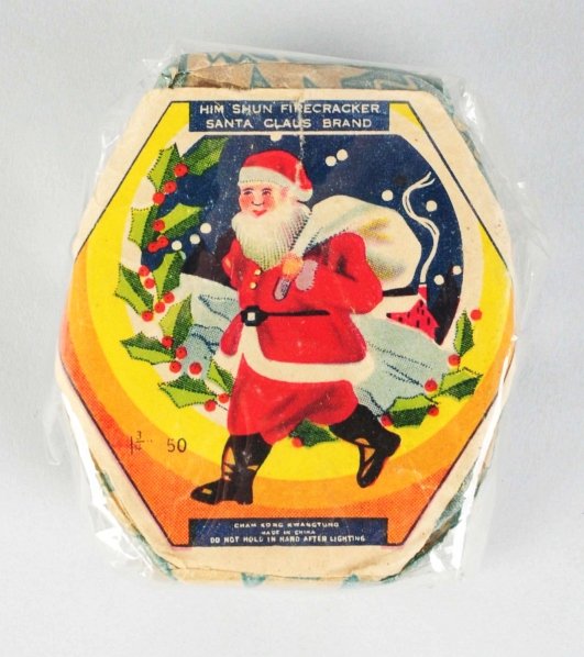 Santa Claus 50 Roll Pack 1 - 3/4" Firecrackers.: Class 1. Manufactured by Cham Kong Kwangstung. May be only example known. Condition (Excellent). Size 2 - 3/8" x 2 - 1/8".