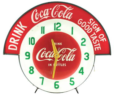 ELECTRIC NEON CLOCK COMPANY ADVERTISING CLOCK FOR COCA COLA W/ MARQUEE TOPPER.: An outstanding displaying example of this Advertising Clock from Electric Neon Clock Company showing Coca Cola advertising face as well as "Drink Coca Cola - Sign Of Good Taste" Marquee Topper. CONDIT