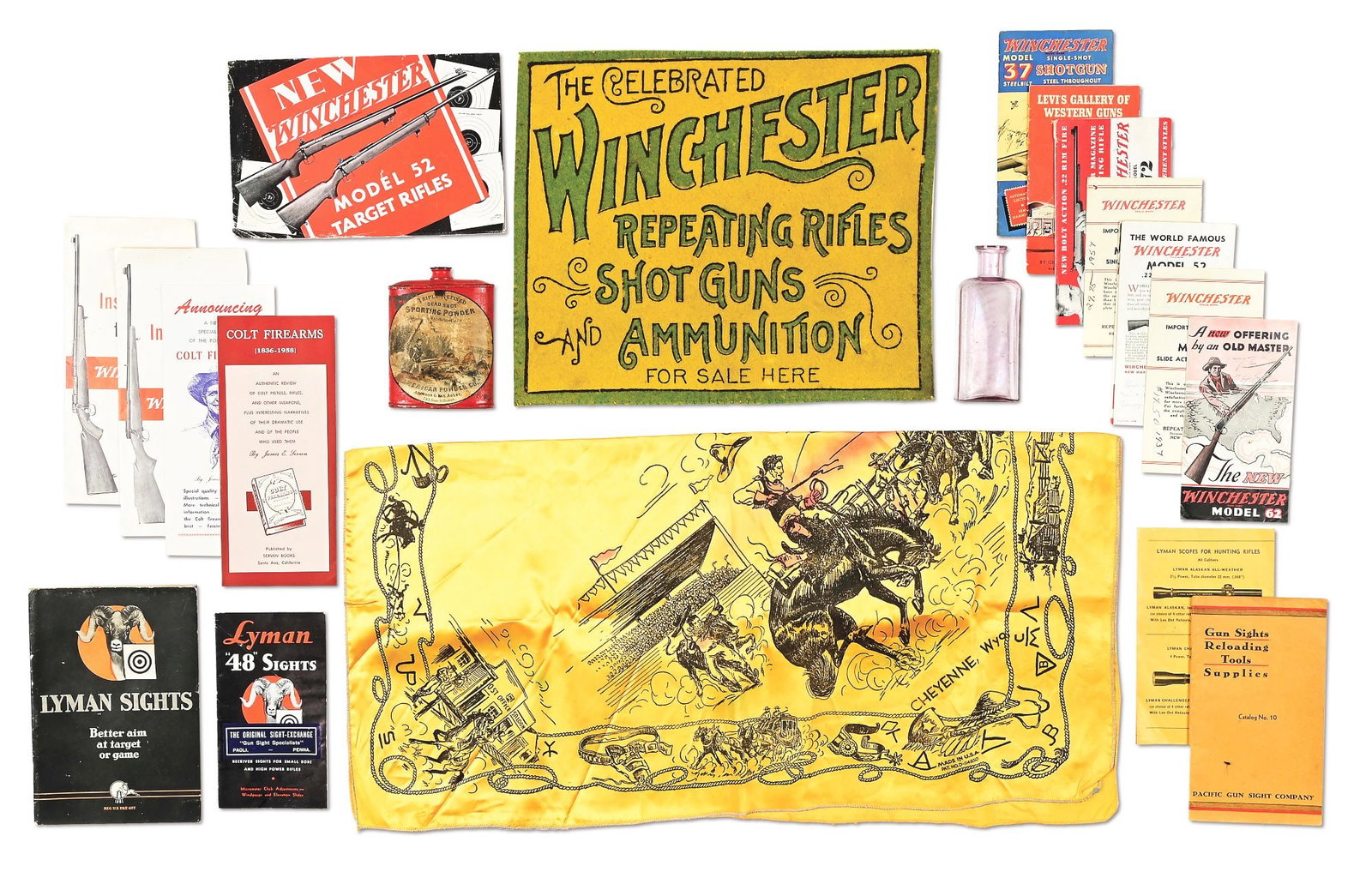 LOT OF FIREARMS EPHEMERA AND WINCHESTER FELT.: Lot consists of firearms-related items including a Winchester dealer advertising counter felt, a silk Cheyenne Round Up souvenir scarf, a Dead Shot powder can, a binder of firearms-related manuals, an