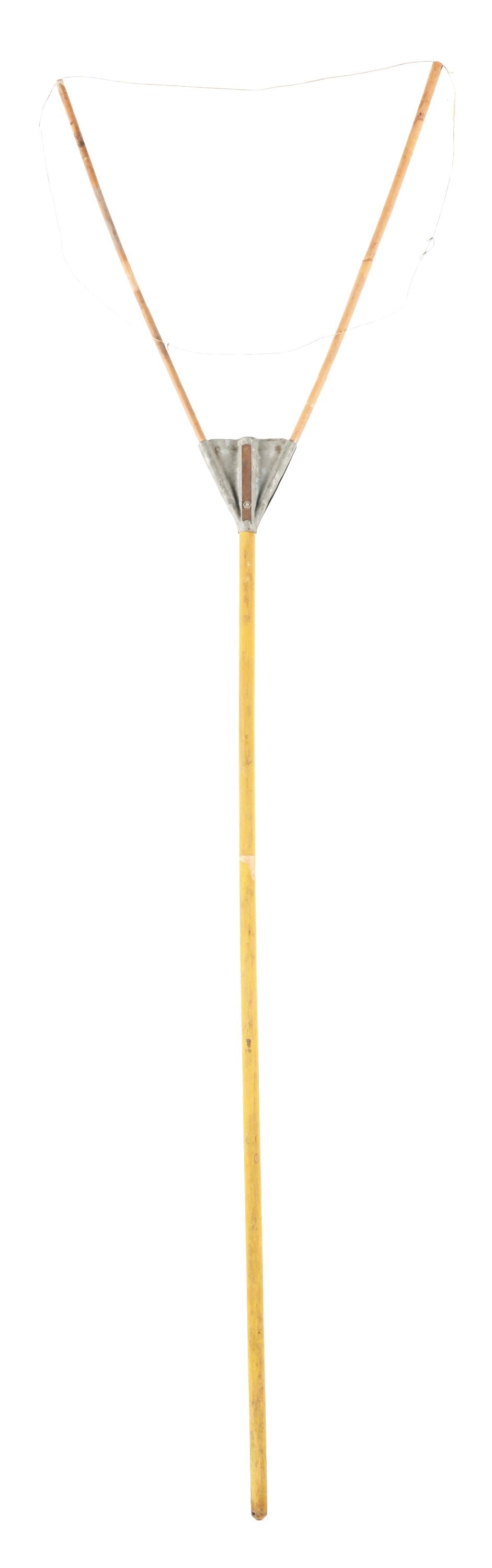 TRAIN ORDER FORK.: A 1940s bamboo train order fork with a long wooden stick. This unit is stamped on the fork junction "THE HI-SPEED DELIVERY FORK CO SHELBYVILLE, INDIANA." There is a note with the fork that indicates t