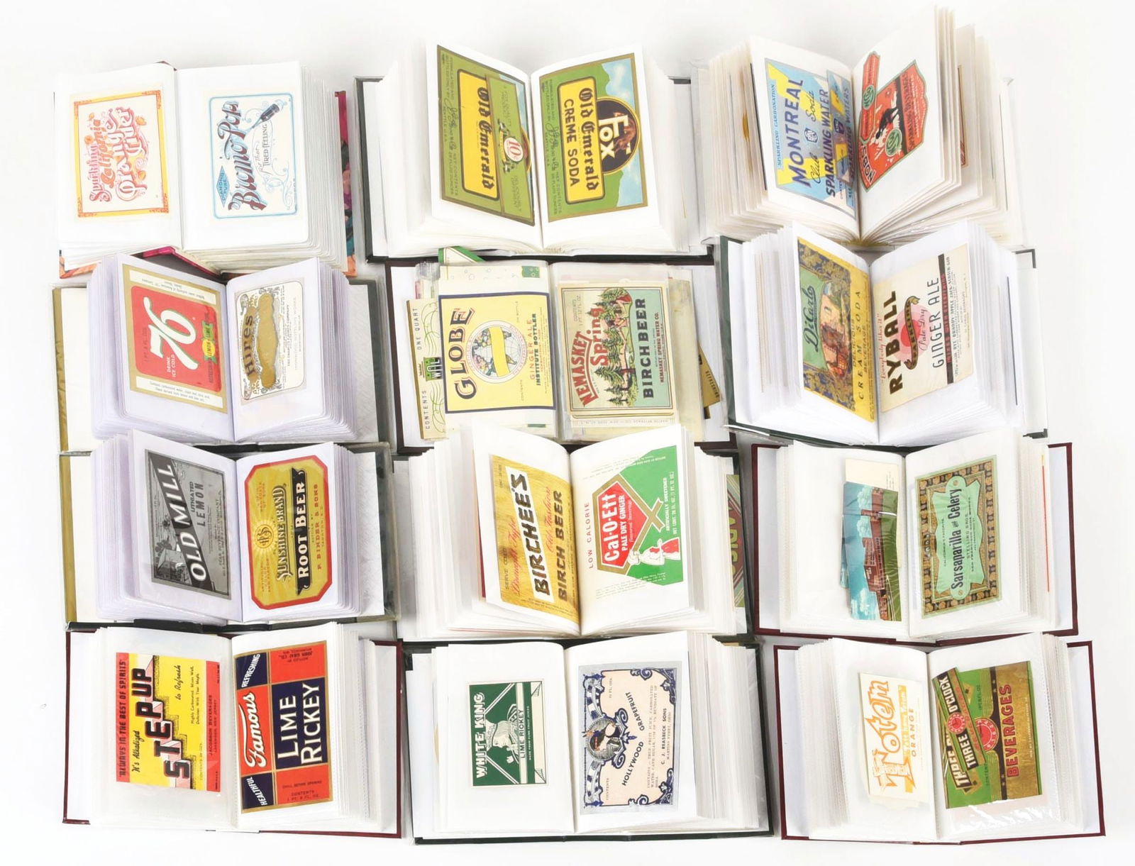 LARGE COLLECTION OF SODA POP BOTTLE W/ ORIGINAL BOTTLE LABELS IN PHOTO ALBUMS. (1 of 2)