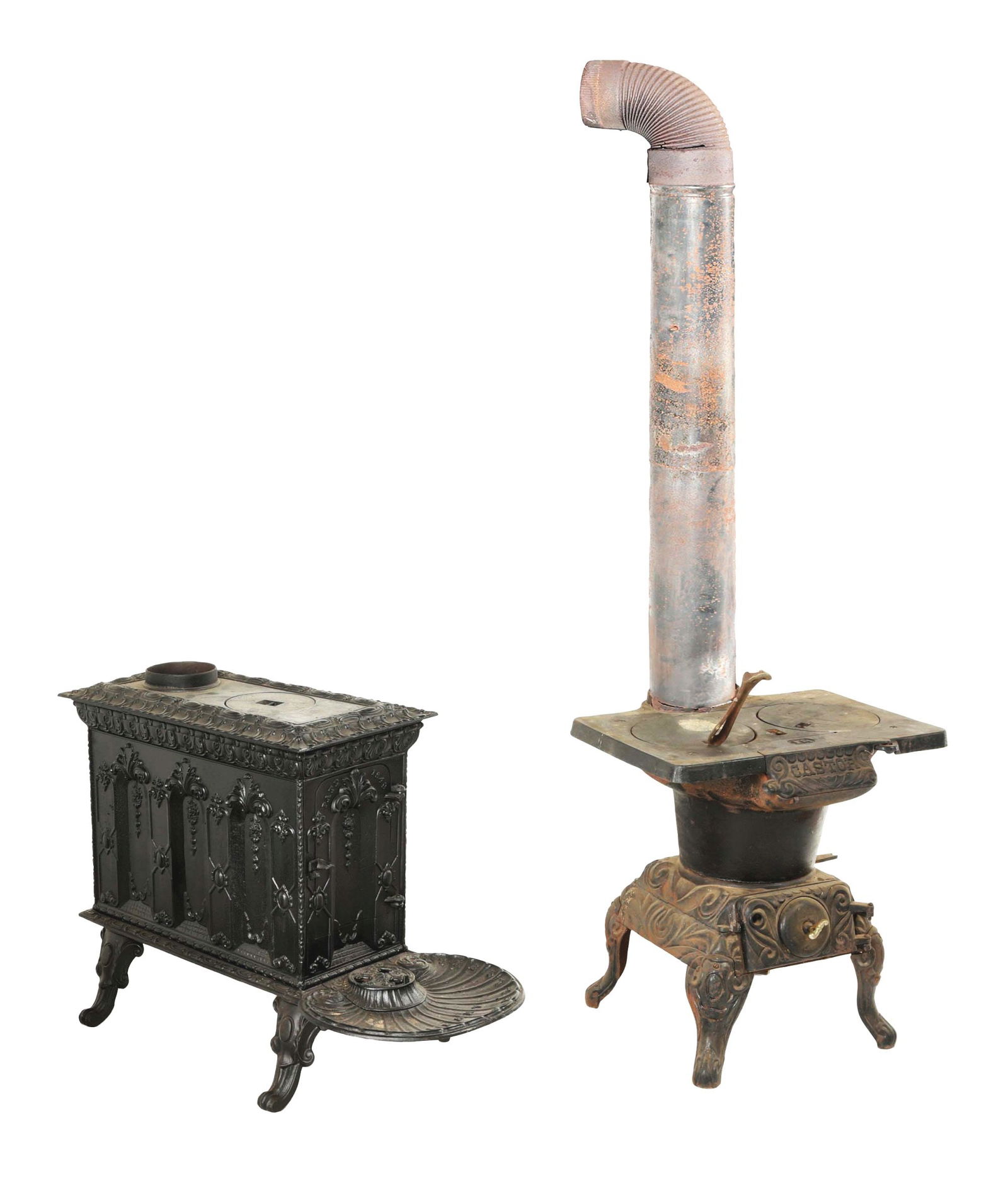 EARLY PAIR OF CAST IRON STOVES. (1 of 9)