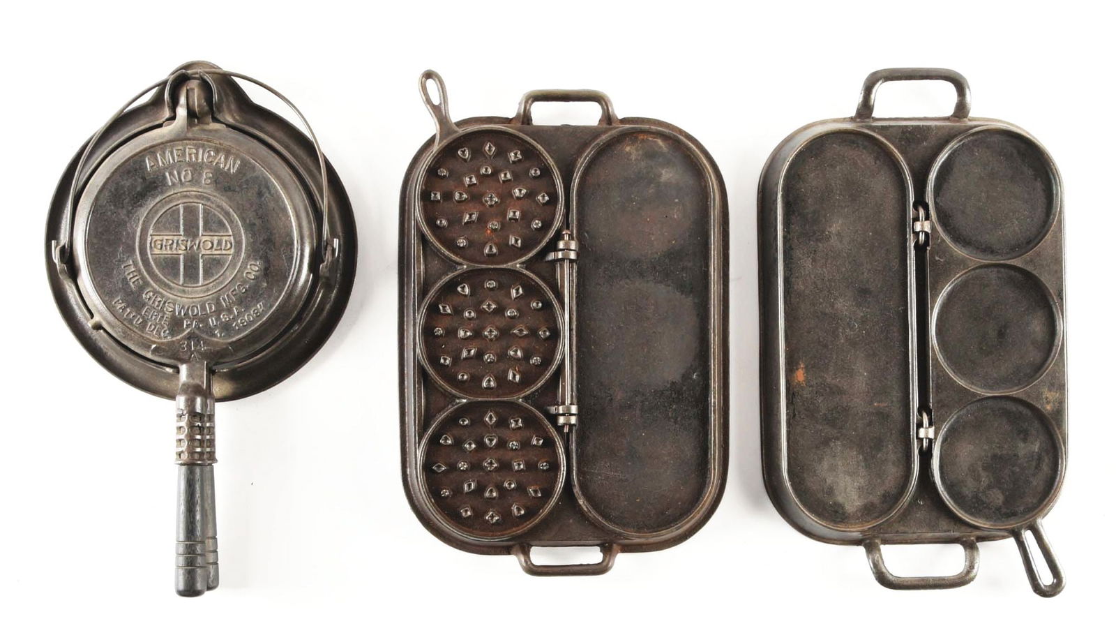 Cast Iron Griswold Waffle Iron And Pair Of Pancake Griddles. Auction
