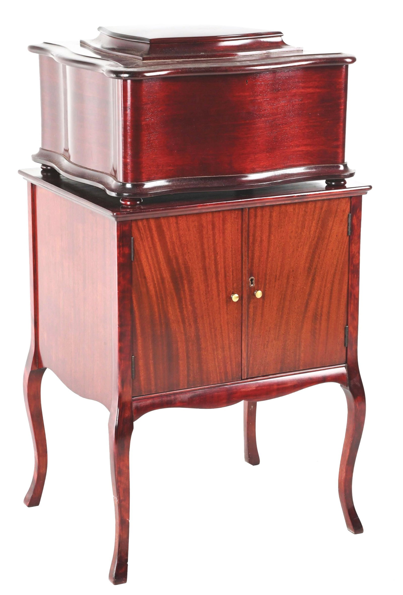 REGINA MUSIC BOX W/ MATCHING ROSEWOOD STAND.: Mahogany Regina music box that has been disassembled, reassembly required. Comes with a matching stand with pull-out shelves for the Regina discs. Machine will need to be reassembled and appears to co