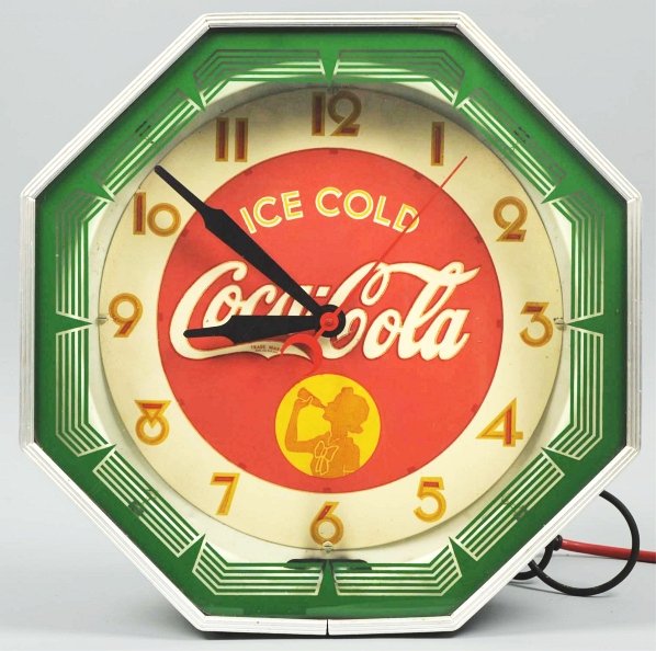 Late 1930s Coca-Cola Octagonal Neon Clock.: Original neon emits nice glow and clock works. Slight fading and crazing, as normally found, with a bit less overall wear. Light case soiling. Condition (Very Good Plus). Size 18 - 1/2" x 18 - 1/4".