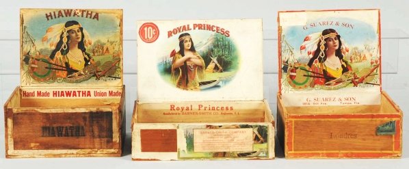 Lot of 3: Indian Girl Cigar Boxes.: Circa 1890s to 1900s. Inner titles include "Royal Princess", "Hiawatha", and "G. Suarez & Son". All images are of Indian girls. Condition (Good - Very Good). Size Largest: 8 - 5/8" L.