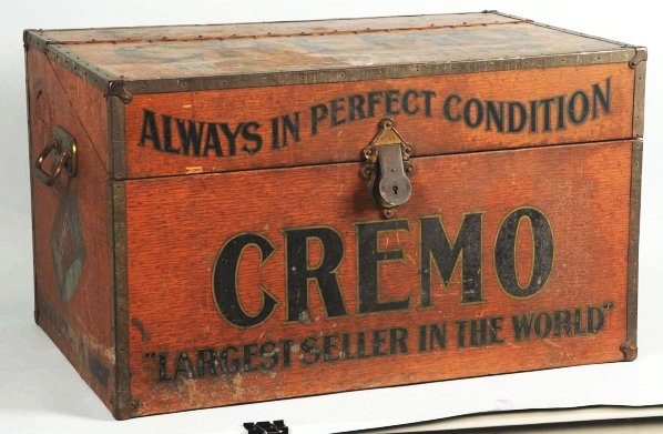 Circa 1910-20 Cremo Cigar Truck & Humidor.: Tin litho surface has overall wear and marks of a heavier than average order. Surface rust on part of top. Condition (Good). Size 17" x 28 - 1/2" x 18 - 1/2".