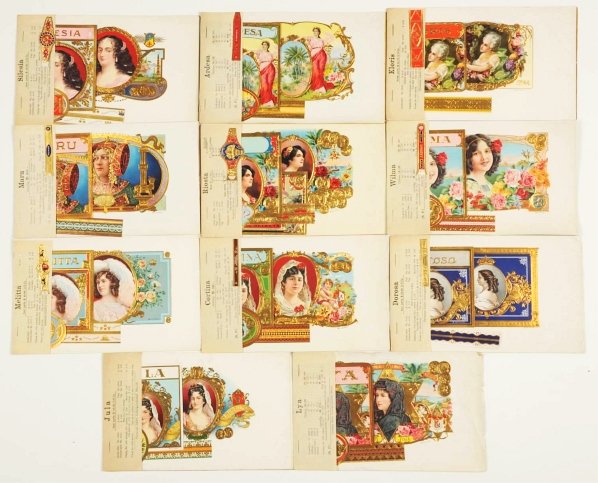 Lot of 11: Lady-Themed Cigar Label Dealer Sets.: Circa 1900s to 1920s. Lot consists of 11 cigar label dealer sample sets. Subject matter includes female portraits. Each set consists of a price sheet and all components for a box (inner, outer, top sh