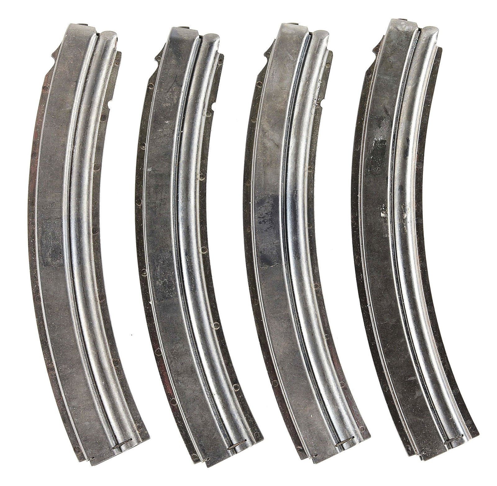 LOT OF 4: DESIRABLE .22 CALIBER MAGAZINES FOR A MODEL 1928 A22 THOMPSON MACHINE GUN.: Consignor states that he purchased these magazines for his 1928 A22 Thompson machine gun, and, although it required some fitting, he adapted one to work and never got around to adapting the others. Co