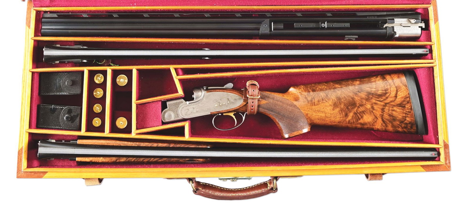 (M) CSMC A-10 AMERICAN FACTORY DELUXE OVER/UNDER SHOTGUN WITH 12, 20, AND 28 GAUGE BARRELS, CASED.: All barrel sets are 30" and constructed with mono-blocs, fit with wide vent ribs, anti-glare matting, red plastic bead front sights, and ejectors. Barrels with CSMC legends and designations ahead of b