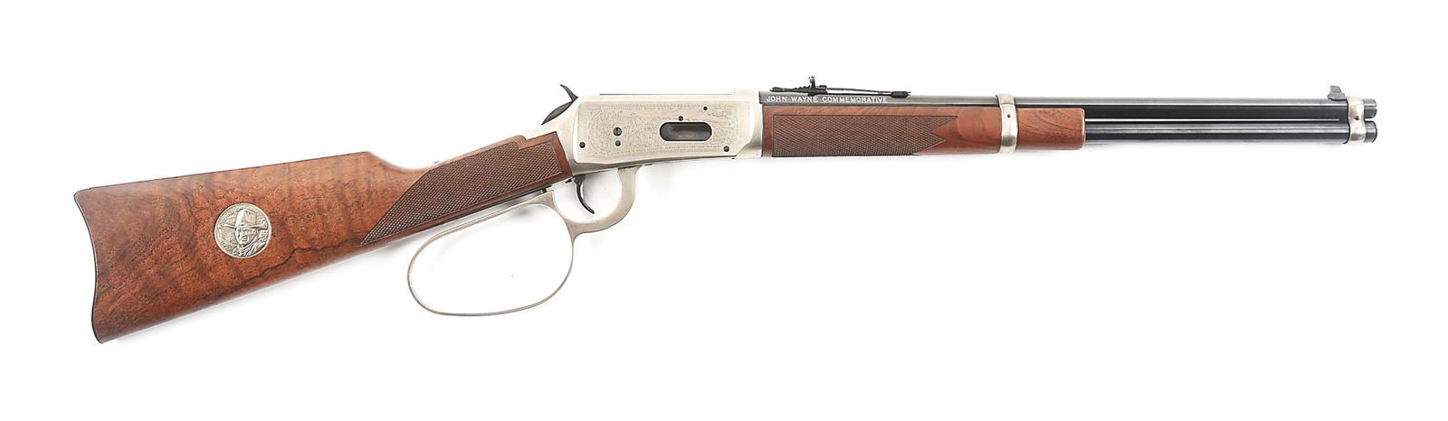 (M) JOHN WAYNE COMMEMORATIVE WINCHESTER MODEL 94 SADDLE RING CARBINE WITH BOX.: Introduced in 1981 to commemorate legendary Western star John Wayne who had passed away 2 years prior. Carbine features an 18" polished blue round barrel chambered in .32-40 and inscribed "JOHN WAYNE