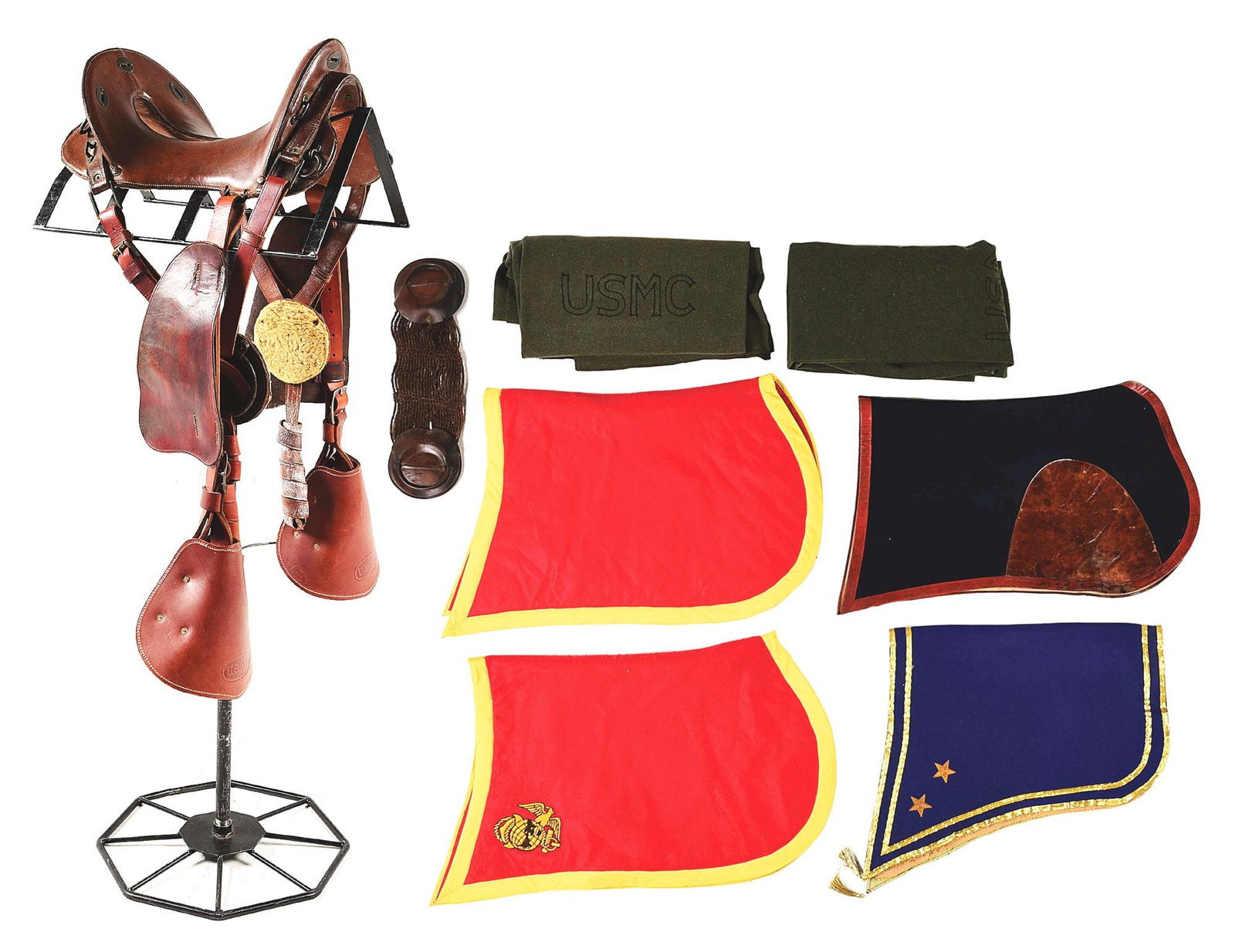 LOT OF US MILITARY SADDLE BLANKETS AND SADDLE.: Lot consists of 4 US military shabraques to include a 2-star general variant, a USMC officer model with red trim, 2 World War I USMC monogrammed wool blankets, and a US M1904 McClellan saddle with USM