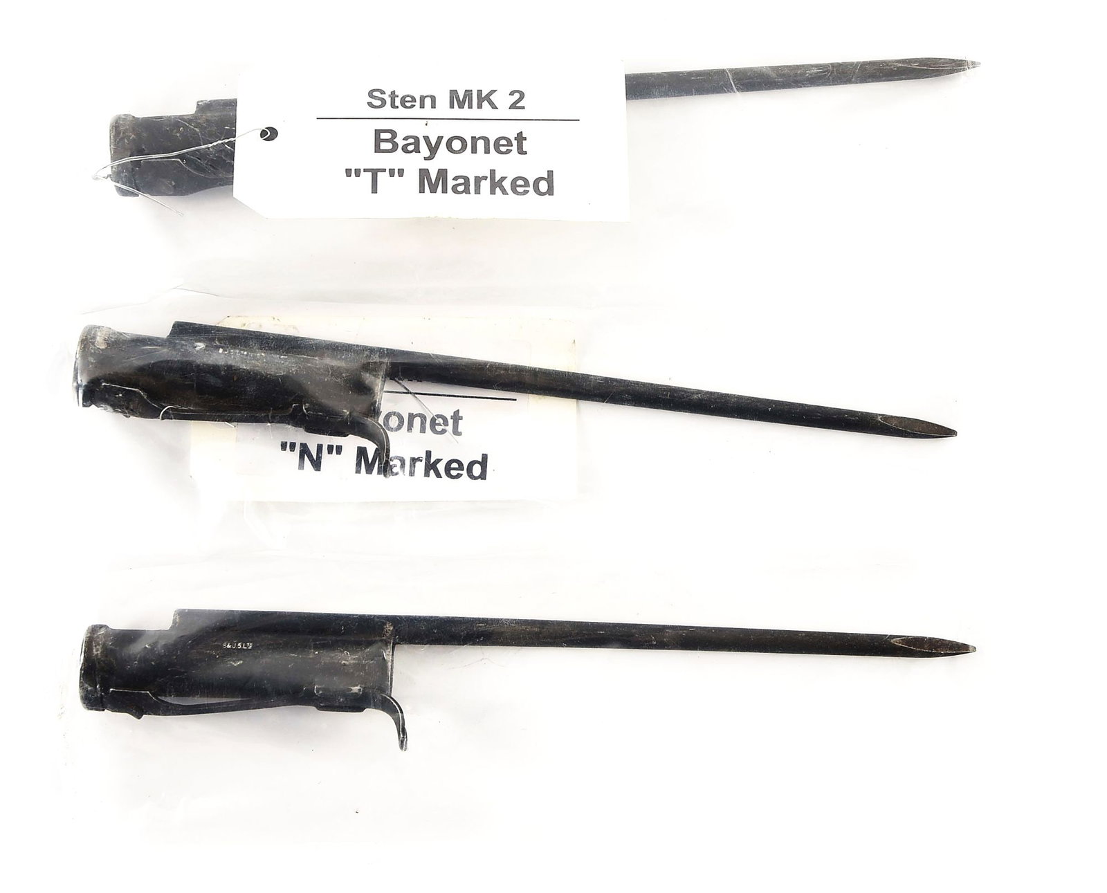 LOT OF 3: DESIRABLE STEN MK I BAYONETS.: Lot consists of 3 MK I spike bayonets for Sten MK II submachine guns bearing various subcontractor markings. No scabbards or frogs present. Each bayonet is sealed in a contemporary clear plastic sleev
