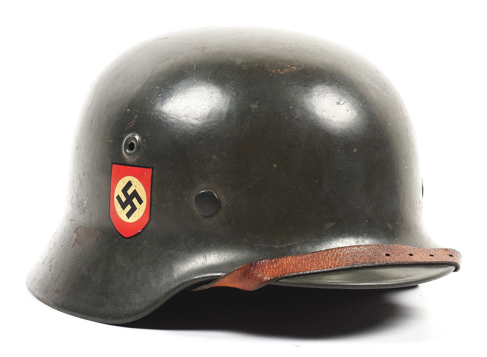 GERMAN WWII COMBAT POLIZEI M40 DOUBLE DECAL HELMET.: German WWII Polizei M40 double decal combat helmet marked "SE66" for the maker "Sachsische Emailler", in a shell size of 66, with a lot number of "4961". Shell retains 90+% of its original smooth gray