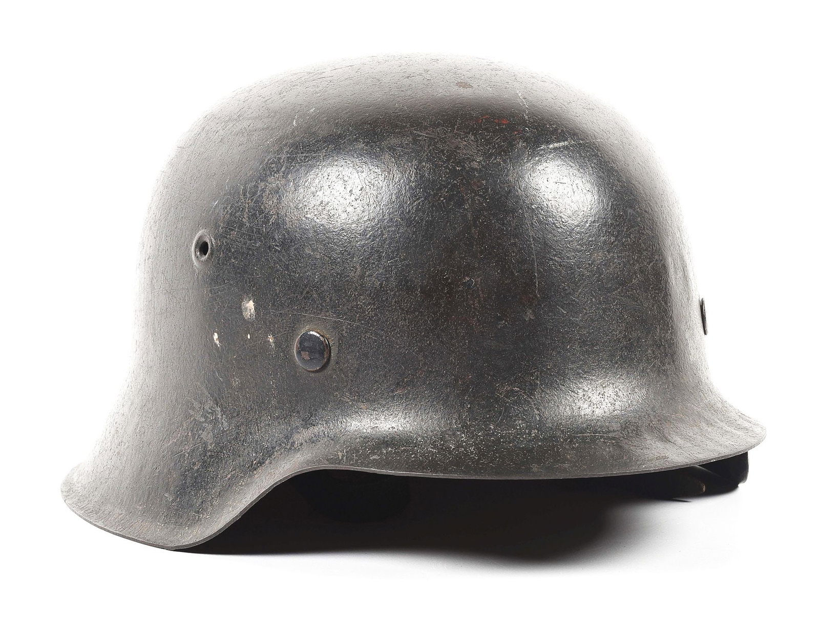 GERMAN WWII SINGLE DECAL LUFTWAFFE M42 HELMET.: German World War II Luftwaffe M42 single decal helmet marked "ET66" for the maker of "Eisenhüttenwerk Thale / Harz", in the shell size of "66", with a lot number of "2426". Shell retains 70-75% o