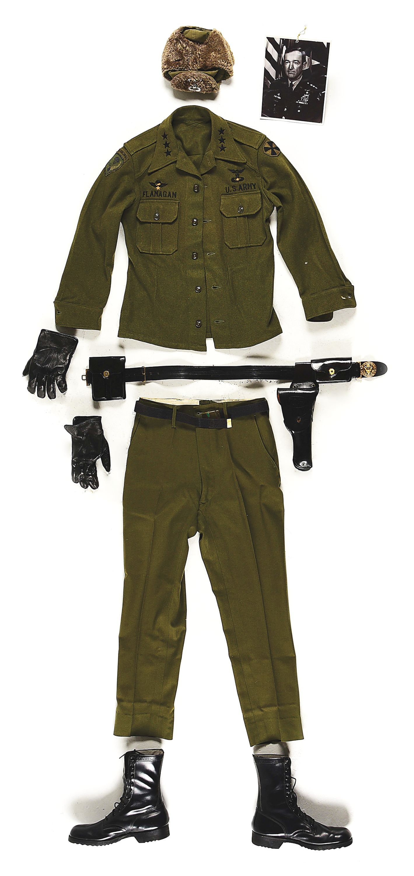 US COLD WAR WOOL FIELD UNIFORM OF GENERAL EDWARD FLANAGAN.: Cold War uniform ensemble consisting of am M1951 wool field shirt with matching trousers, US Army style black boots, M1951 pile field cap, black leather gloves, and black 1911 pistol belt. The shirt i