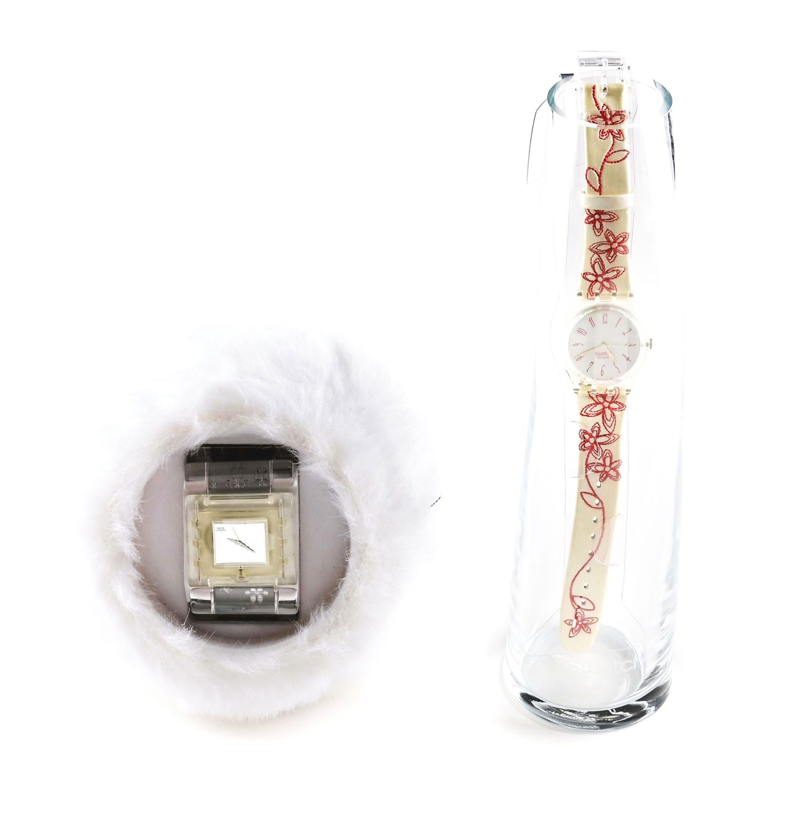 LOT OF 2: SPECIALS AND WORLDWIDE SWATCHES.: (A) SUBZ100 "Snowqueen" Specials Collection Swatch Watch. Limited Numbered 1,386 of 9,999. Issued in Christmas 2002. (B) GZS36PACK "Motherly" Worldwide Packaging Swatch Watch. Issued in Mother's Day 2