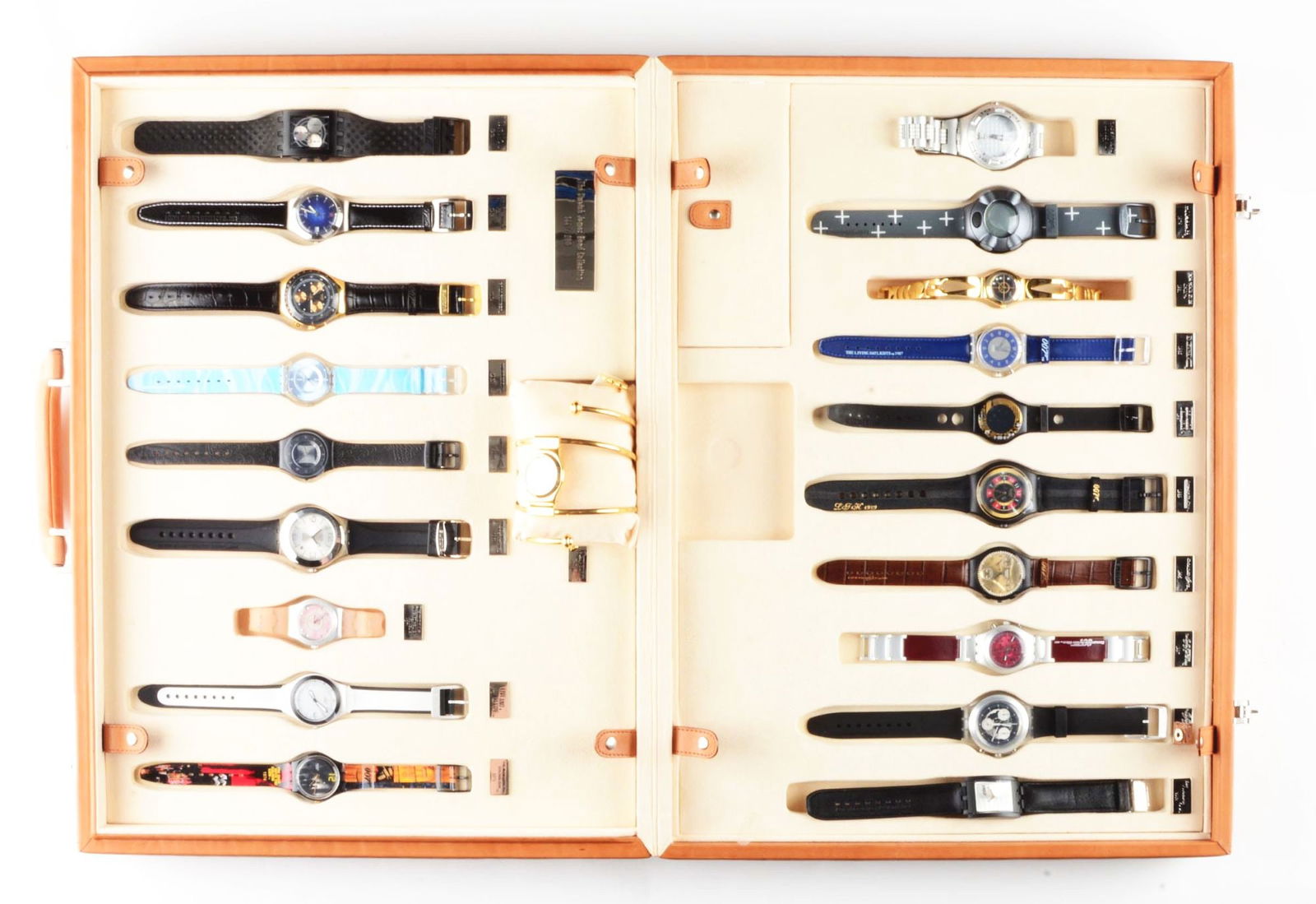 JAMES BOND 007 LEATHER SUITCASE.: SZS007 "James Bond series in Leather Suitcase" Specials Collection Swatch Watches. Suitcase contains all 20 James Bond Specials Collection Swatches. Included Swatches: GB210 "The Man With The Golden G