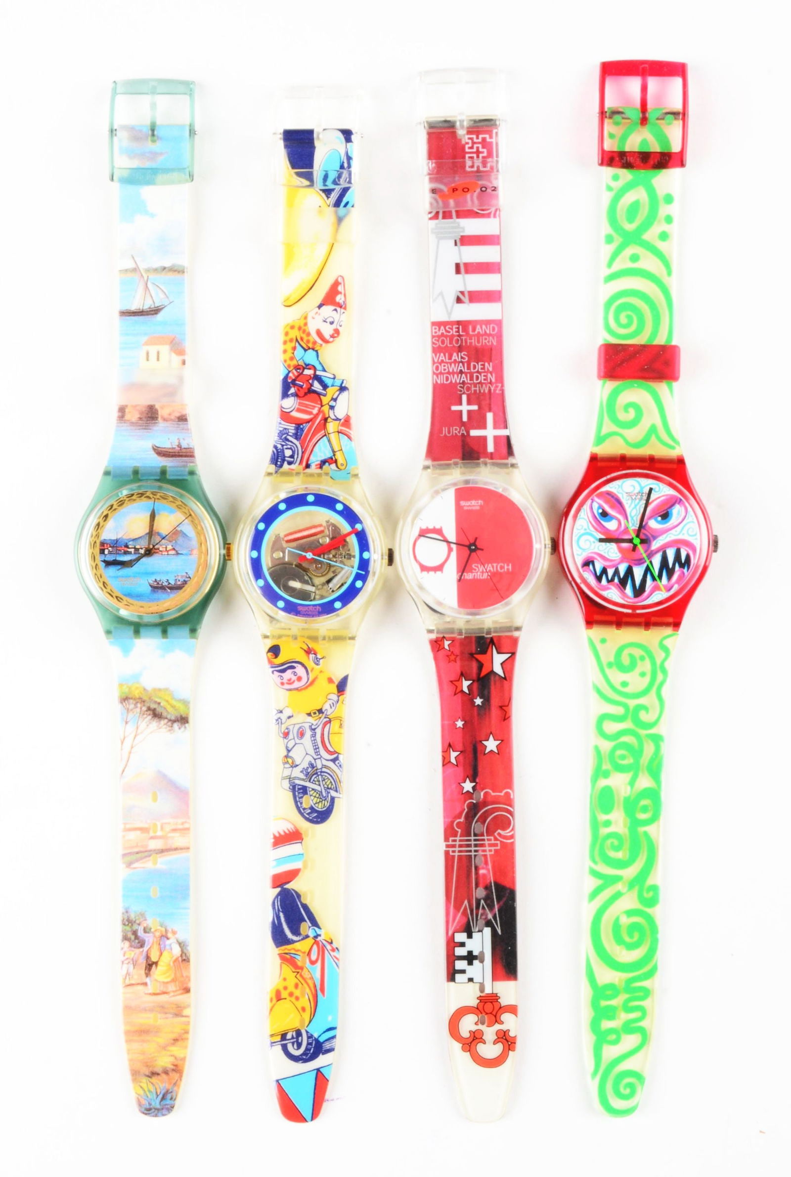 LOT OF 4: ORIGINAL AND SPECIALS SWATCHES.: (A) GM124 "Sole Mio" Standard Gents Swatch Watch. Issued in 1988. (B) GK155 "Tin Toy" Standard Gents Swatch Watch. Designed by Andrea Arrigoni. Issued in 1993. (C) GZ175 "27avel Chantun Swatch" Specia