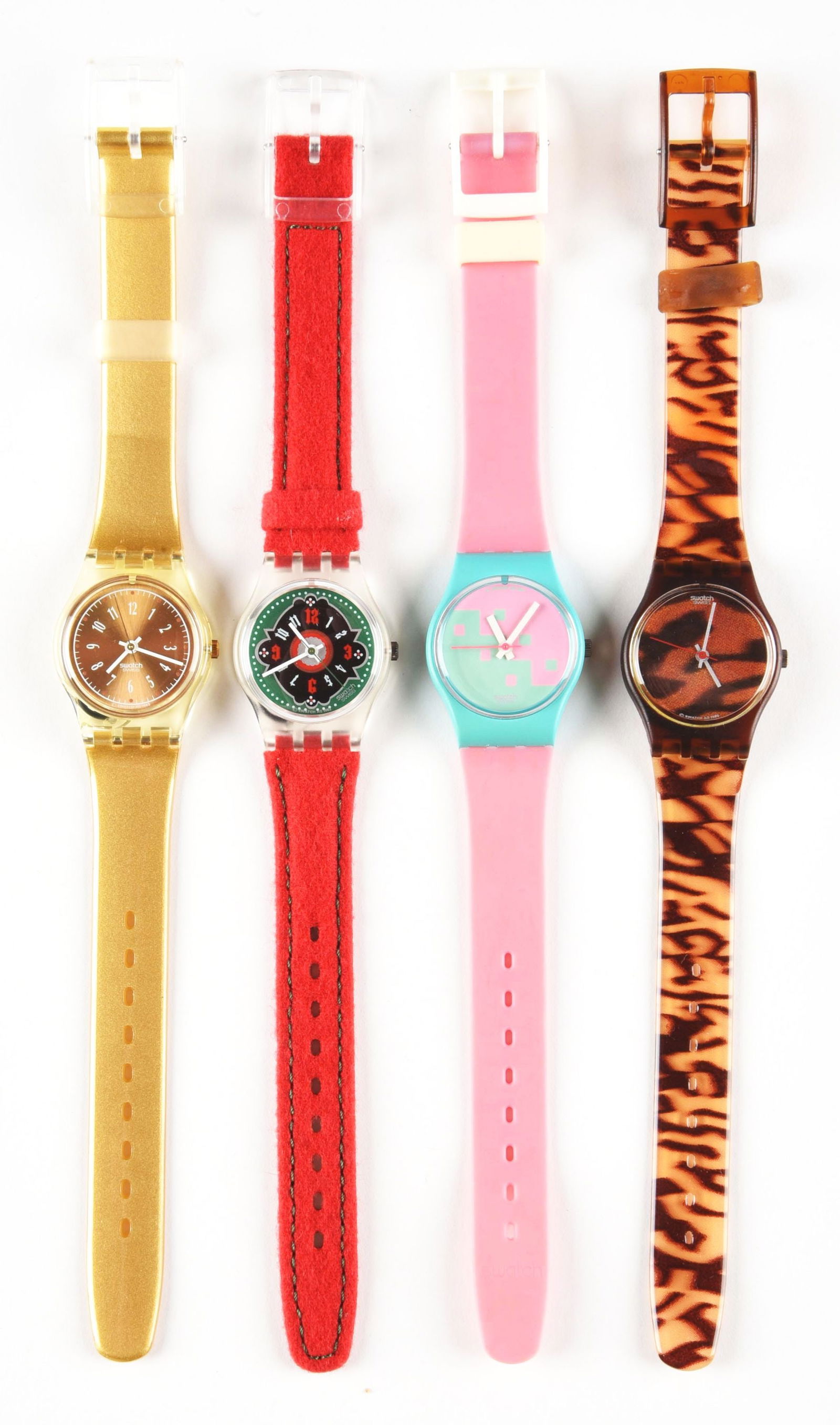LOT OF 4: LADIES SWATCHES.: (A) LK148 "Lady Sky" Standard Ladies Swatch Watch. Issued in 1994. (B) LK144 "Chesa Veglia" Standard Ladies Swatch Watch. Issued in 1993. (C) LL102 "Pink Cassata" Standard Ladies Swatch Watch. Issued