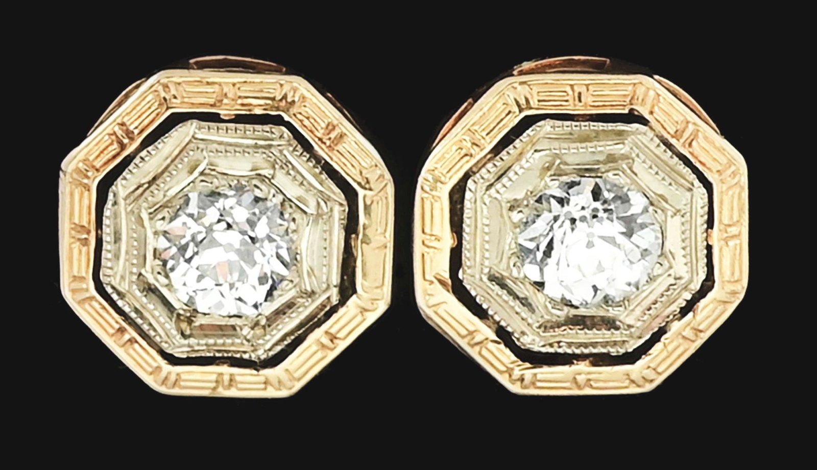 LADIES’ ANTIQUE 14K GOLD DIAMOND EARRINGS.: Ladies' antique 14k yellow and white gold diamond earrings set with 2 old mine-cut round diamonds measuring approximately 3.5mm, with an estimated total weight of 0.20cts. Marked "14K" on one earring,