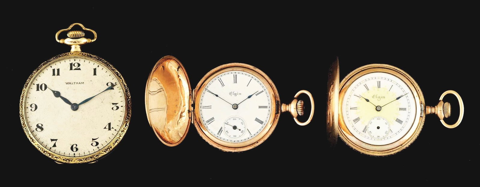 LOT OF 3: GOLD FILLED AMERICAN POCKET WATCHES: Lot of 3 yellow gold filled pocket watches. (A) Waltham 43mm open face, movement #12537262, runs intermittently. (B) Elgin 34mm hunting case, movement #6934056, running. (C) Elgin 35mm hunting case, m