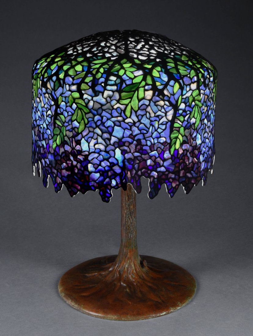 WISTERIA LEADED GLASS TABLE LAMP FROM COLLECTION OF DR. EGON NEUSTADT IN THE STYLE OF TIFFANY: One of the finest examples of an American Wisteria leaded glass table lamp on patinated bronze tree base. This lamp came from the original collection of renowned Tiffany Studios expert and author, Dr.