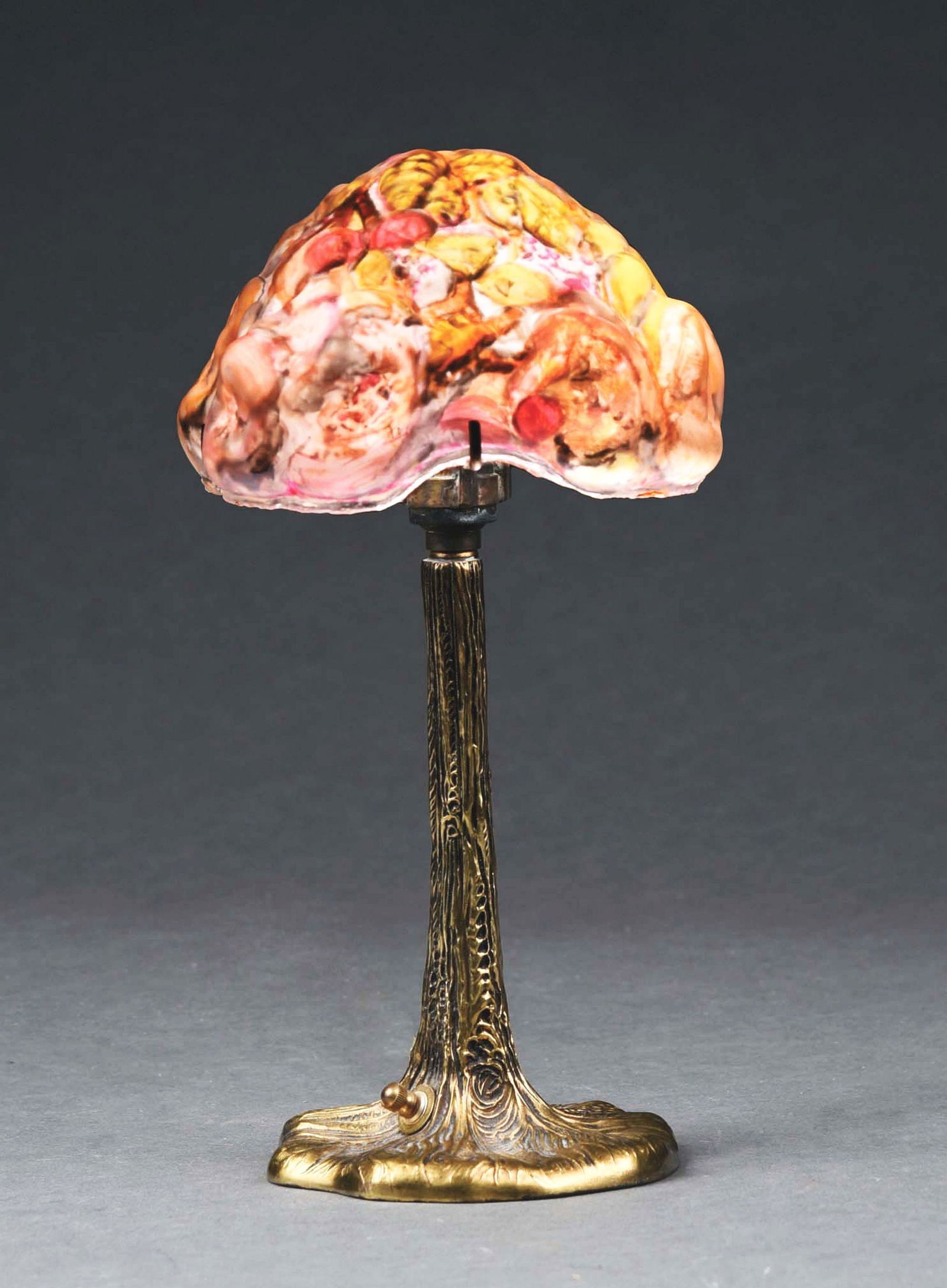 PAIRPOINT MINIATURE PUFFY LAMP.: A beautiful miniature puffy lamp by Pairpoint. The 7" diameter blown-out shade is painted with an elaborate pattern of multi-colored flowers and butterflies in shades of yellows, pinks and purples. It