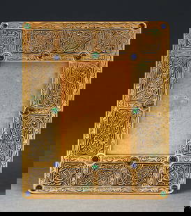 TIFFANY STUDIOS 9TH CENTURY PICTURE FRAME.: A beautiful gilt bronze picture frame by Tiffany Studios. Rectangular frame is finished in gold dore, and features the 9th century pattern. The frame is further decorated with a series of round jewels