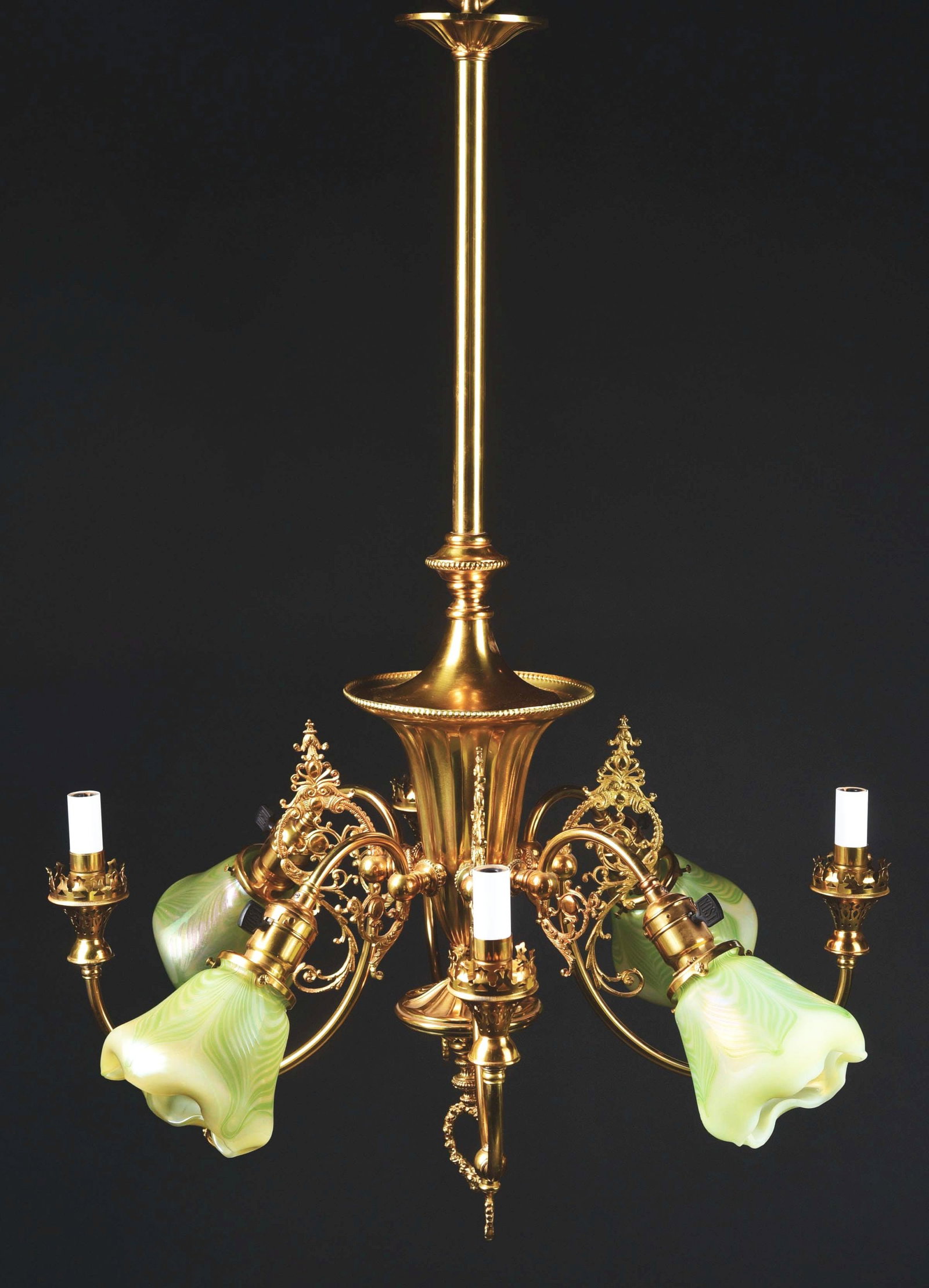 BRASS & ART GLASS 8-LIGHT CHANDELIER: This beautiful early 20th century gas chandelier has been electrified. It is composed of ornamental brass with four beautiful iridescent pulled-feather art glass shades. CONDITION: It is in excellent 