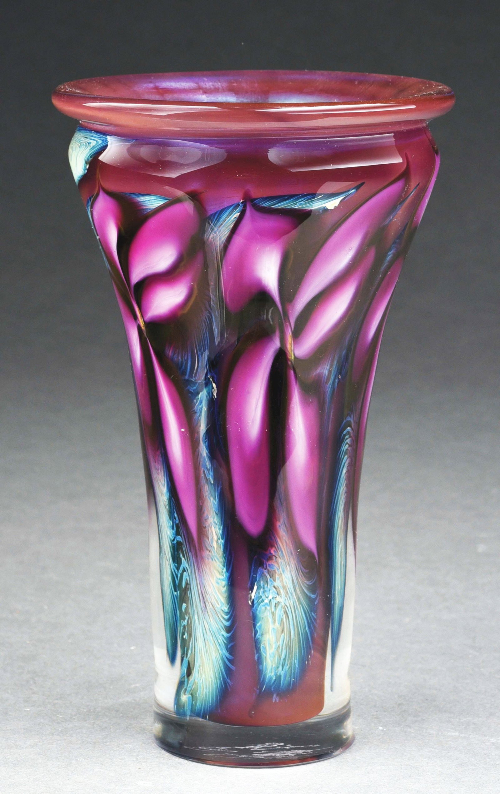 ART GLASS VASE BY DAVID LOTTON: Heavy paperweight glass with red flowers and green feathered glass background. Dated 1995 and artist signed. Vase top 5" diameter. No damage, scratches or repairs. Condition: (Excellent) Item Dimensio