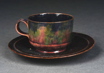 GEORGE OHR (1857-1918) “THE MAD POTTER OF BILOXI”, GLAZED EARTHENWARE CUP & SAUCER: C. 1901. Impressed "G. E. OHR BILOXI." Condition: (Excellent) Item Dimensions: 5" x 5" x 2 - 1/4".