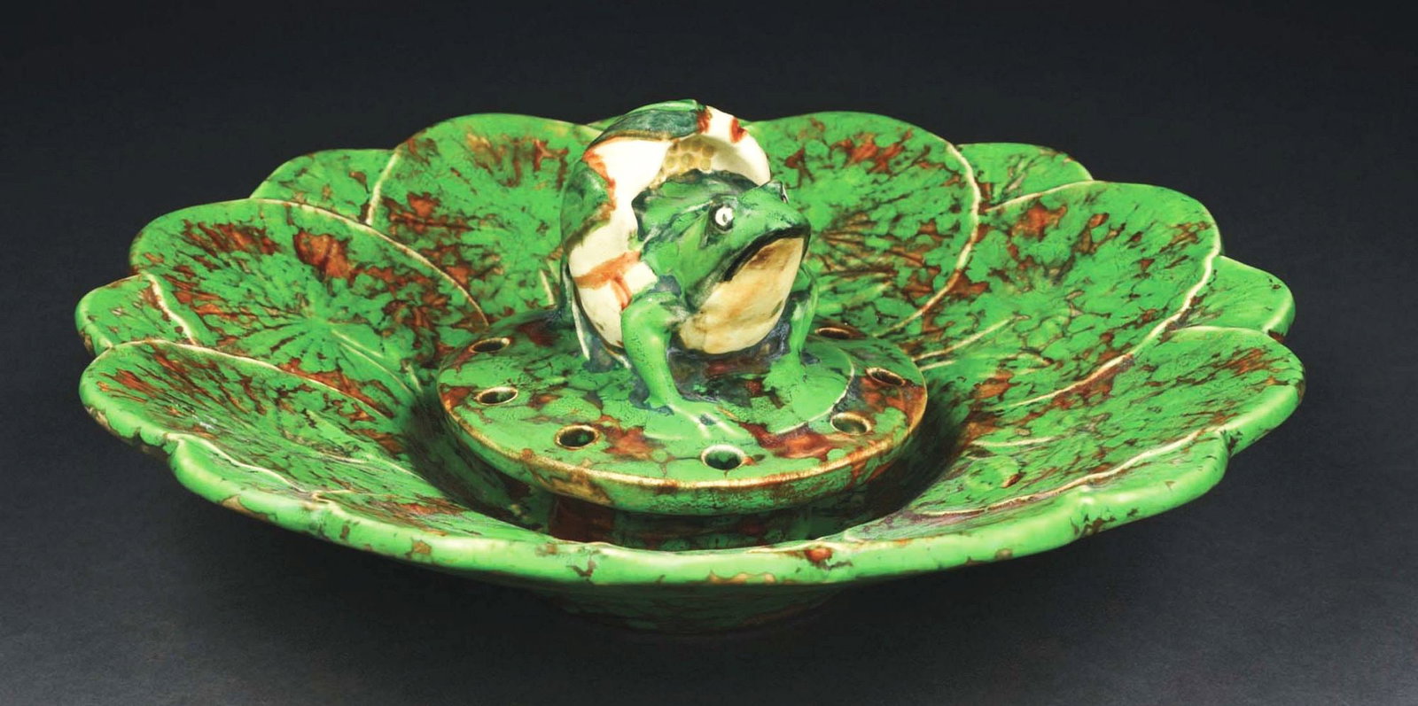 WELLER POTTERY "COPPERTONE" RARE ELABORATE LOTUS FLOWER BOWL: Weller Pottery rare elaborate lotus flower bowl with a removable highly-decorated flower frog with a frog in a lotus flower. Strong vibrant glazing, unmarked. Condition: (Excellent). Item Dimensions: 