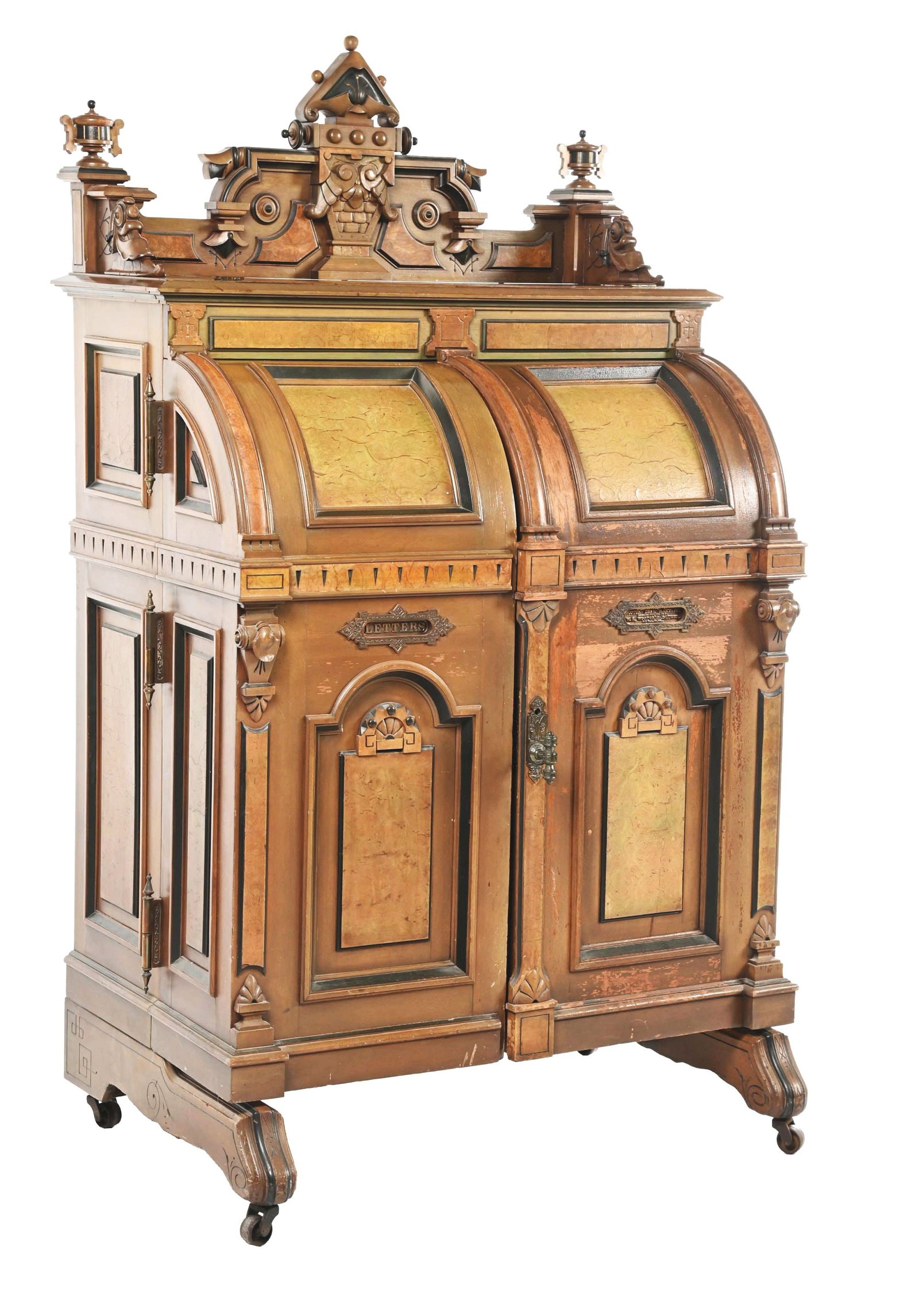 WALNUT EXTRA GRADE WOOTON DESK.: C. 1874 Indianapolis IN. Carved renaissance revival desk has a fancy carved gallery with ornate corner pieces, has large burled panels with incising throughout; oversized doors are curved at the top, 
