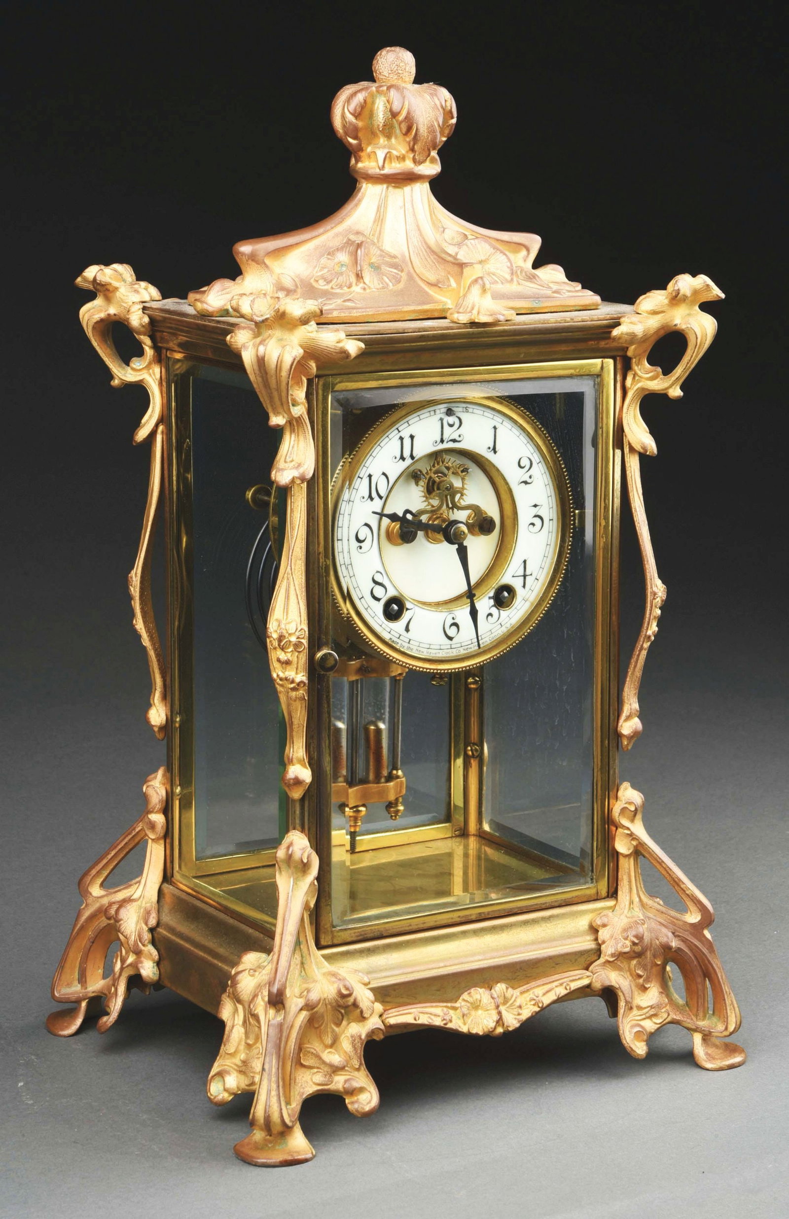 ANTIQUE BRASS ANSONIA CRYSTAL REGULATOR CLOCK: Ansonia crystal regulator mantel clock with open escapement, working chimes, in all original condition. CONDITION: Working, showing an aged patina to the bronze, no cracks or repairs to the dial and o