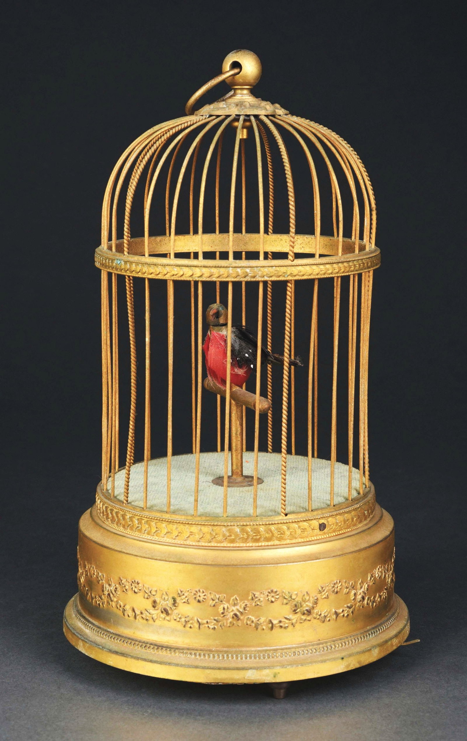 FRENCH WIND-UP SINGING BIRD IN CAGE AUTOMATON: This is a period French singing bird cage with a single bird in original condition. CONDITION: Bright brass cage, all original feathers, smooth operation and working. Condition: (Very Good) Item Dimen