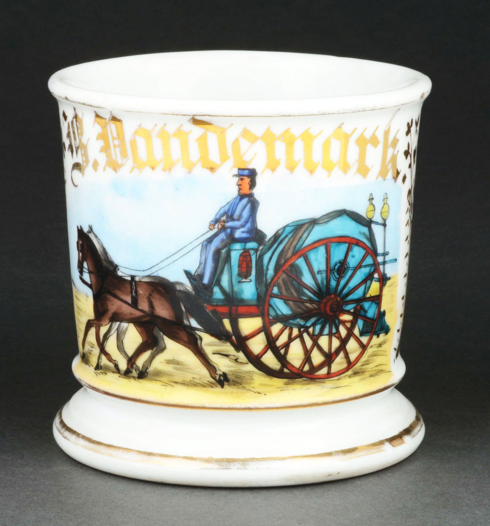 HORSE-DRAWN FIREFIGHTERS CART SHAVING MUG.: Has the name "B. Dandemark" in gold gilt. Mug is stamped "T&V France" under base. Rare image of a horse-drawn fire reel cart. Condition: (Excellent). Item Dimensions: 4 - 1/2" x 3 - 1/2" x 3 - 1/2".
