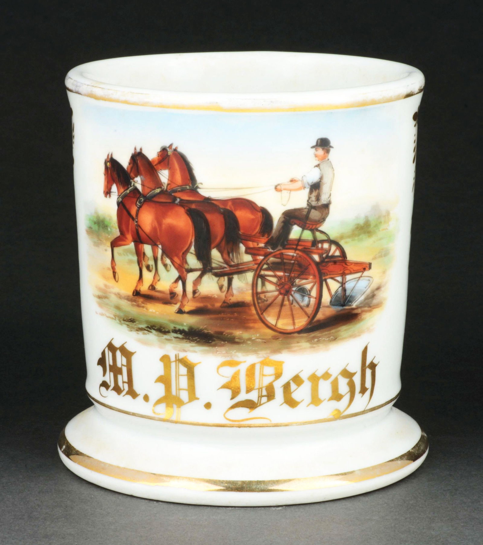 FARMER SHAVING MUG: Has the name "M. Bergh" in gold gilt. Nice image of man with a horse-drawn cart preparing ground. Condition: (Excellent) Item Dimensions: 4 - 3/4" x 3 - 3/4" x 3 - 3/4".