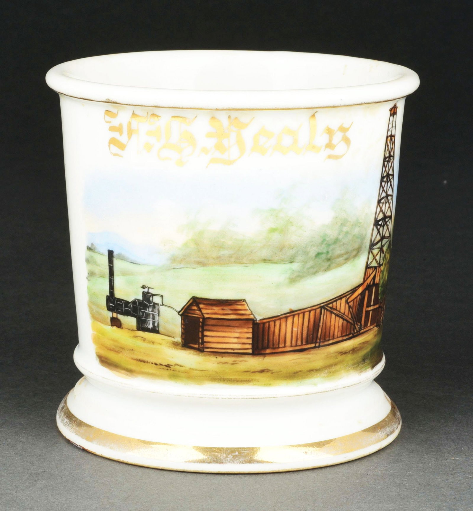 OILRIG OPERATOR SHAVING MUG.: Has the name "F.S. Healy" in gold gilt. Mug is stamped "AND Limoges France" under base. Detailed image of a oilrig with pump. Condition: (Excellent). Item Dimensions: 4 - 1/2" x 3 - 1/2" x 3 - 1/2".