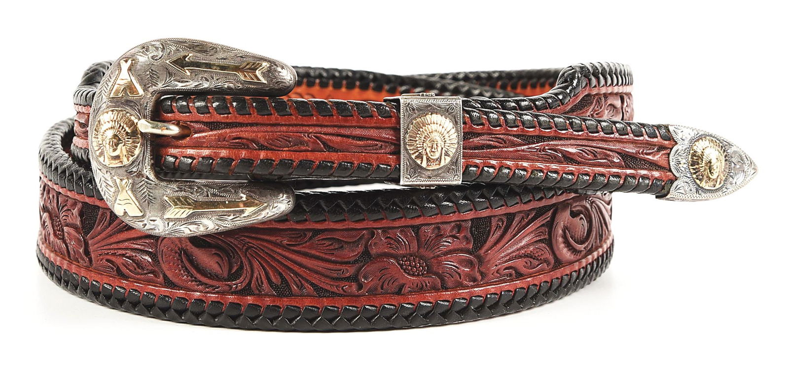 HIGH NOON MARKED INDIAN THEME BUCKLE ON BELT PLUS COLLAR TIPS: a) "High Noon" marked 3/4”, 3-piece sterling and 10K gold Indian theme buckle set affixed to a superb, floral carved and leather laced Keith Seidel (Cody, Wyo) burgundy colored belt. Belt measur